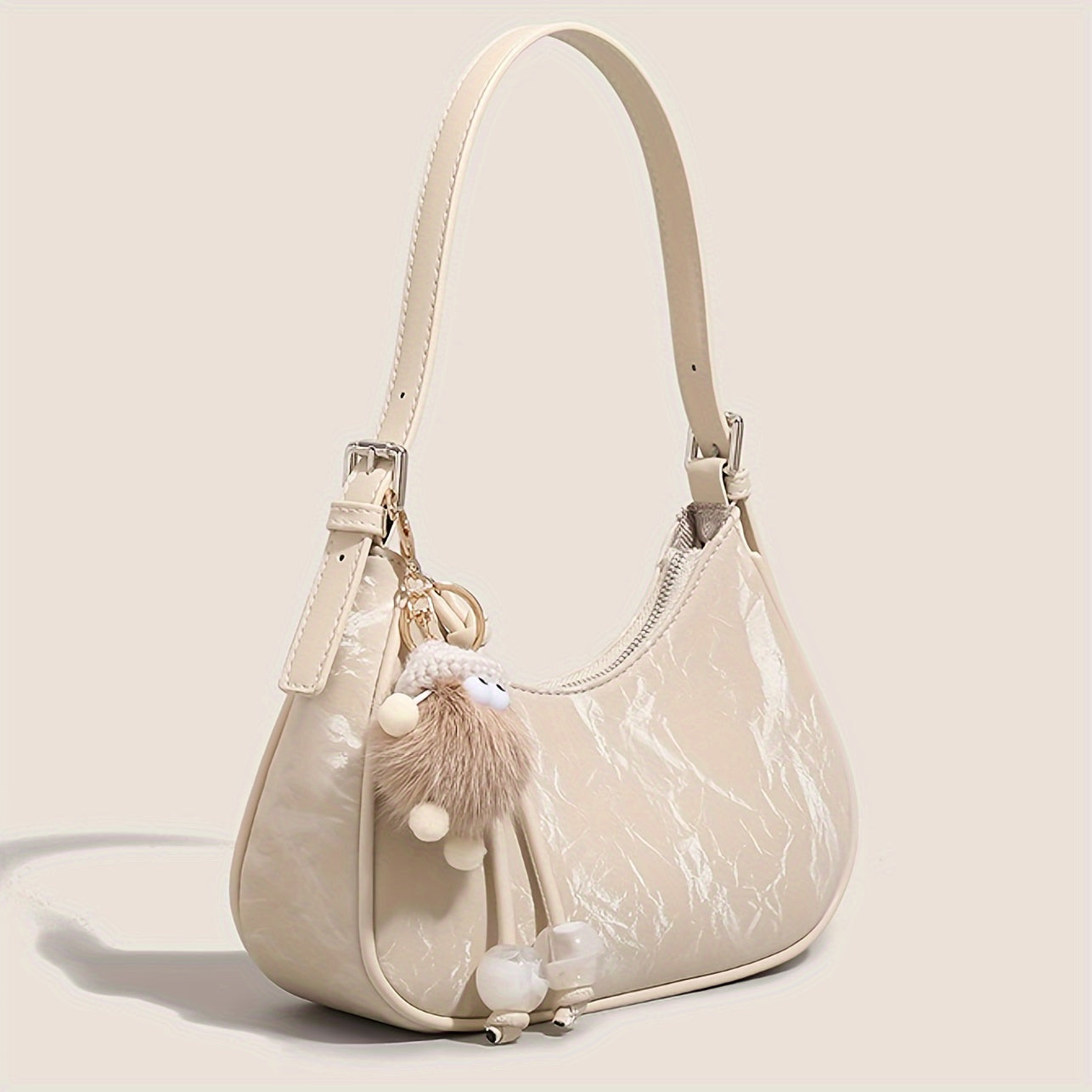 Chic Creamy-White Crescent Moon Crossbody Bag for Women - Adjustable Strap, Zip Closure, Minimalist Design with Pom Pom Charm, Perfect for Spring & Summer